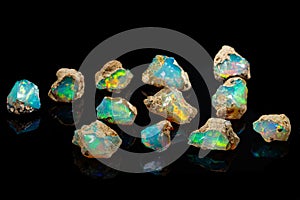 Macro mineral stone rare and beautiful opals on a black background