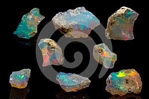 Macro mineral stone rare and beautiful opals on a black background