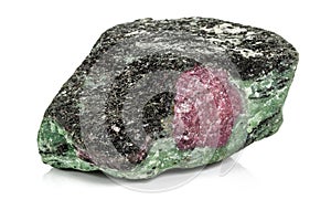 Macro of mineral stone ruby in rock on white background