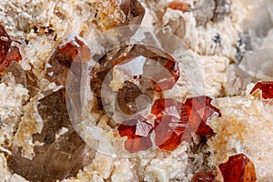 Macro mineral stone Spessartine, Feldspar, Smoky quartz, on a white background