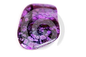 Macro mineral stone sugilite on white background