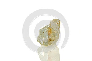 Macro mineral stone topaz on a white background