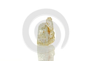 Macro mineral stone topaz on a white background