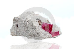 Macro mineral stone tourmaline on a white background