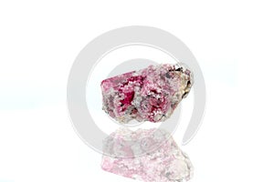 Macro mineral stone tourmaline on a white background