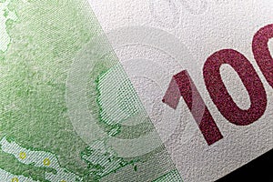 Macro, number 100, and copyspace of hundred euro banknote