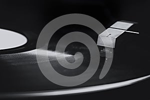 Macro of old vinyl record player in black and white
