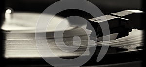 Macro of old vinyl record player in black and white