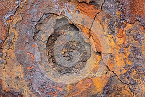 Macro old and weathering circle of rust on metal