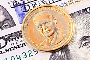 One dollar golden coin with Dwight D. Eisenhower photo