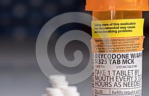 Macro of oxycodone opioid tablet bottle