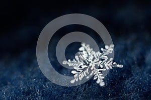 Macro photo of beautiful snowflake