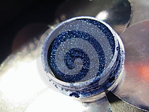 Macro photo blue eye shadow pigment glitter gloss cosmetic make up