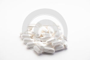 Macro photo of a bunch of little white zinc pills