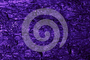 violet macro photo of coal, texture background