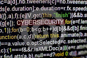 Macro photo of computer screen with program source code and highlighted CYBERSECURITY inscription in the middle. Script