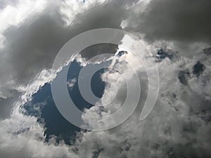 macro photo with a decorative natural background perspective of the sky with storm clouds and sunlight for design