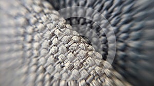 Macro photo of fabric, braided corners close up. Beige and grey fabric in maxilla