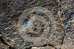 Macro photo of the fusion crust from a Chondrite Meteorite, piece of rock formed in outer space in the early stages of Solar