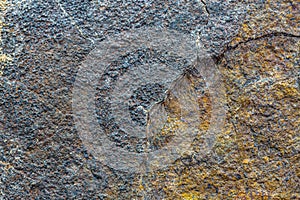 Macro photo of the fusion crust from a Chondrite Meteorite, piece of rock formed in outer space in the early stages of Solar