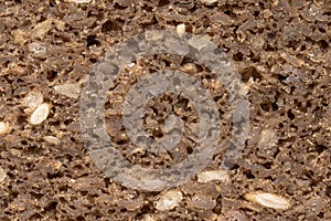 Macro photo of German dark rye bread, known as Pumpernickel