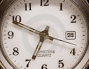 Macro photo of a ladies watch. Clock hands. An antique clock. Old picture. Time signals.