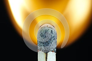 Macro photo of a matches when ignited, burning off. Lit fire.