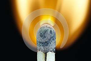 Macro photo of a matches when ignited, burning off. Lit fire.