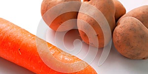 Macro photo of potatoes and carrots