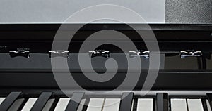 Macro photo of a satin black and white portable digital piano