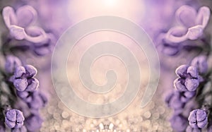 Macro photo of a silver shiny background with purple violet flowers with copy space