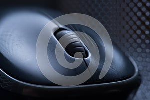 macro photo. Single wireless computer mouse on a dark gray background