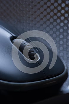 macro photo. Single wireless computer mouse on a dark gray background
