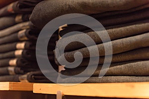 Macro photo stack of blue jeans at casual clothing shop in America