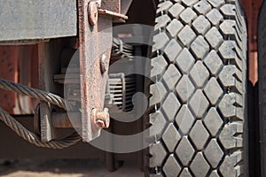 Macro photo tire tread wheels in dust textured background