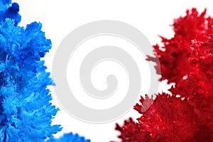 Macro photography blue and red salt crystal white background.