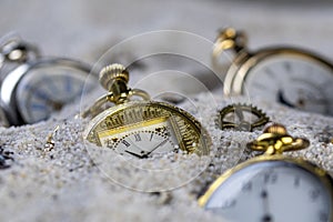 Macro photography of many or group of old gold pocket watches