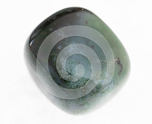 polished heliotrope (bloodstone) gem on white photo