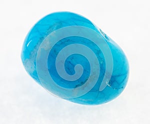 tumbled blue howlite (turquenite) stone on white photo