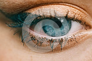 Macro photography of a nice blue-green eye of a woman