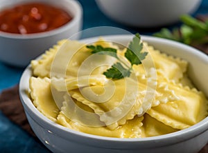 Macro photography. Portion of delicious Italian ravioli drizzled with melted butter and a green sprig of parsley. In the