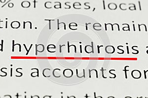 Macro photography of the word hyperhidrosis