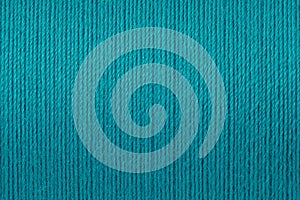 Macro picture of turquoise thread texture background