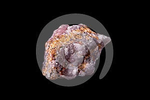 Macro pink Smithsonite mineral stone on microcline on black background