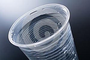 Macro Of A Plastic Cup Filled Up With Nearly 200ml Water