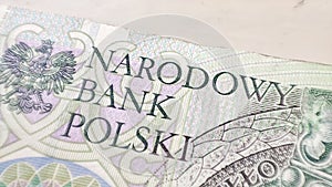 Macro PLN Polish 100 zloty banknotes background. One hundred zloty banknotes detail