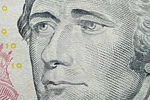 macro portrait of Alexander Hamilton : American statesman and one of the Founding Fathers of the United States on $10 dollar bankn