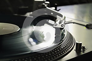 Macro of a professional DJ record player. Concept: Music, DJ, hobby, passion photo