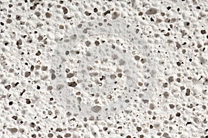 Macro of pumice stone. Grey porosity Stone, rough pumice texture background