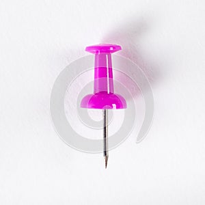 Purple push pin in white background or wallpaper